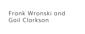 Frank Wronski and Gail Clarkson engaged in conversation at a professional event, showcasing collaboration and camaraderie.